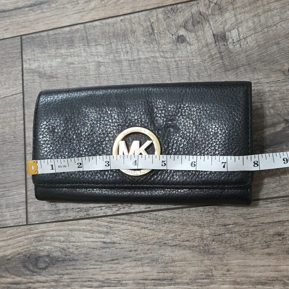 Michael Kors Fulton Large Flap Continental Wallet in black pebbled leather